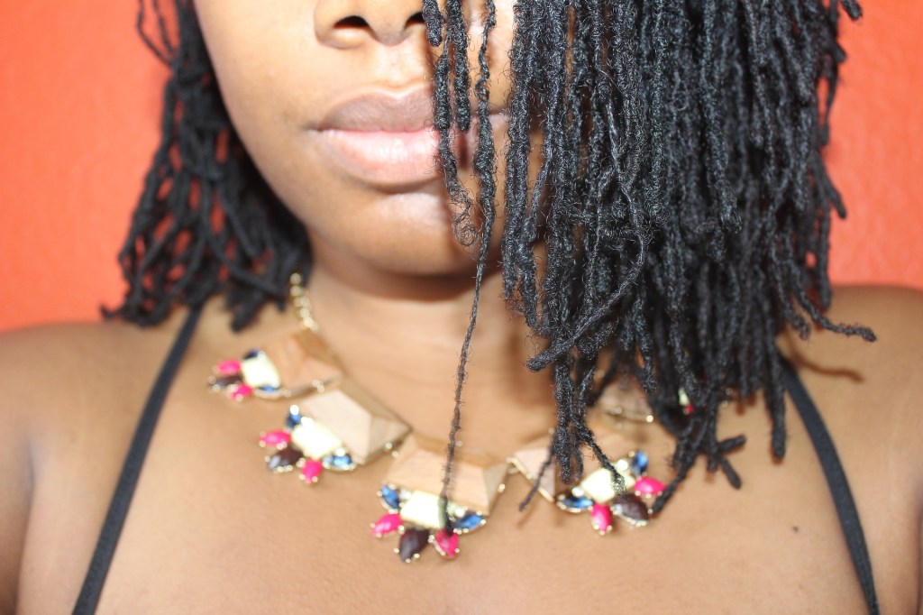 Girl with sister locs/locks.